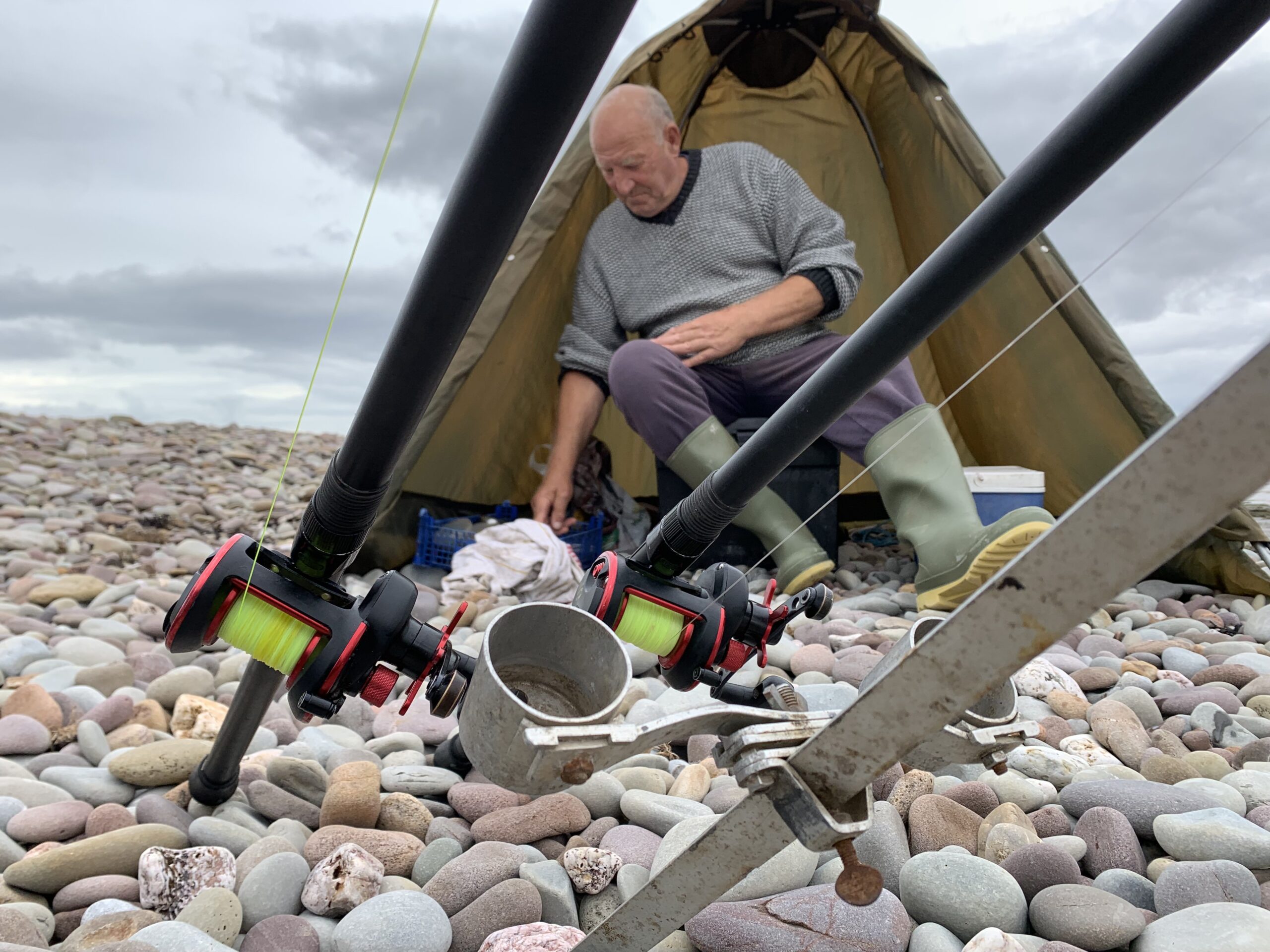 sea fishing rods on the beach